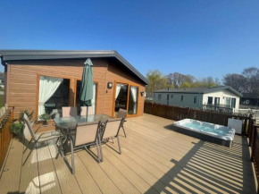 Luxury Lakeside Lodge L1 with hot tub situated at Tattershall Lakes Country Park